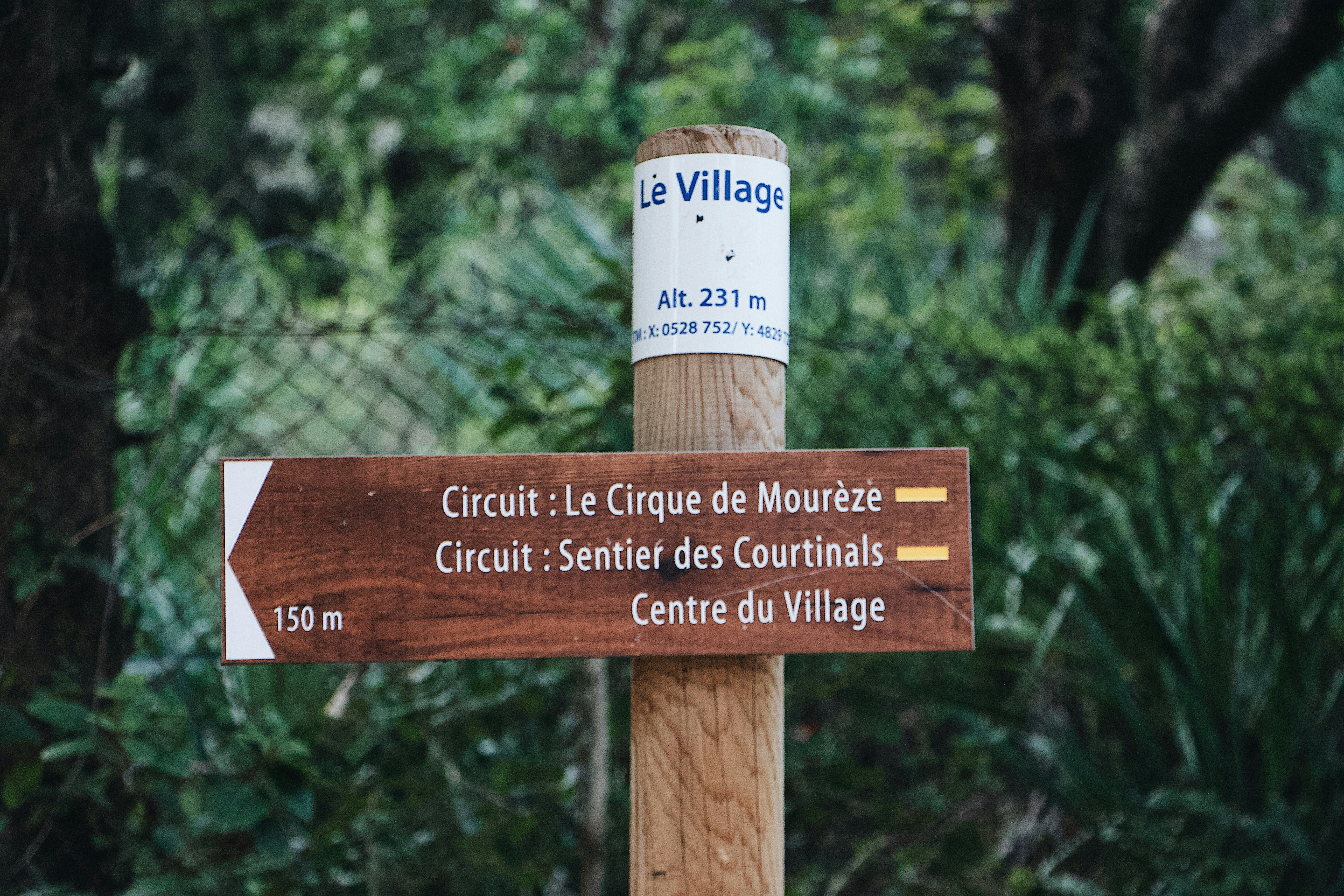 circuit: le cirque de moureze signboard on post near plants